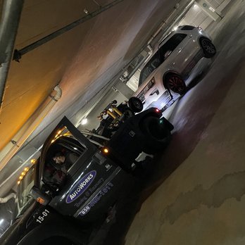 Destin Auto Center - The vehicle being towed out of a parking garage. - Tires Near Me - Destin, Florida Destin Auto Center - The vehicle being towed out of a parking garage. - Tires Near Me - Destin, Florida