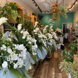 Stem n' Leaf - Spray arrangement for forest theme grand opening.