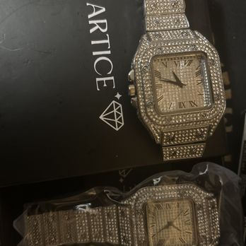 Cartier - The watch n the plastic is Cartice the other is the 6$ aliexpress watch - Jewelry Near Me - Manhasset, New York