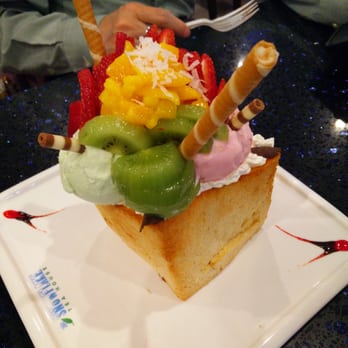 Snowflake Tea House - One of the Special Honey Toasts with Strawberries, Kiwis, Mangos, ice cream, and biscuits! - Desserts Near Me - Duluth, Georgia Snowflake Tea House - One of the Special Honey Toasts with Strawberries, Kiwis, Mangos, ice cream, and biscuits! - Desserts Near Me - Duluth, Georgia