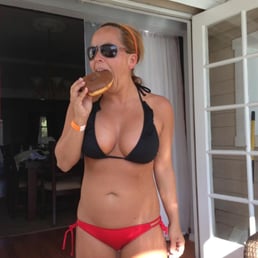 This is exactly one week after my BA surgery. Me... Stuffing my face with a donut. ;)