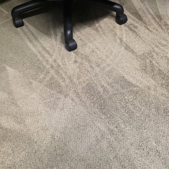 Merit Carpet & Upholstery Cleaning - There used to be heavy matted, ground in dirt and coffee stains below this chair.. not anymore! (And the carpet is now fluffy) - Carpet Cleaning Near Me Merit Carpet & Upholstery Cleaning - There used to be heavy matted, ground in dirt and coffee stains below this chair.. not anymore! (And the carpet is now fluffy) - Carpet Cleaning Near Me