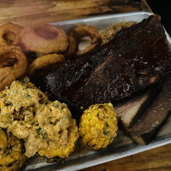 Whiskey 'N Rye Smokehouse - The trio with a side of onion rings and corn - Barbeque Near Me - Solvang, California Whiskey 'N Rye Smokehouse - The trio with a side of onion rings and corn - Barbeque Near Me - Solvang, California