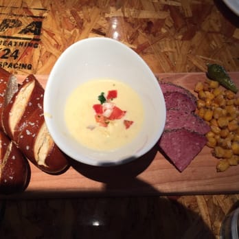 OHSO Distillery - Pretzel board: two loaves, queso, salami, corn nuts, pickles. - New American Near Me - Scottsdale, Arizona OHSO Distillery - Pretzel board: two loaves, queso, salami, corn nuts, pickles. - New American Near Me - Scottsdale, Arizona