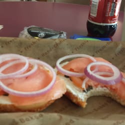 Einstein Bros. Bagels - Lox yes please.  On a cheese and spinach bagel? Even better. A little tomato and onion? I'll try it.