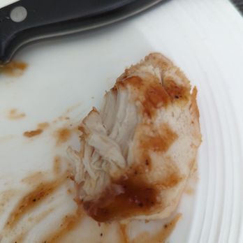 Costco - Rotisserie chicken with some bbq sauce. For $5 for a whole chicken, it's a steal. - Wholesale Stores Near Me - Houston, Texas