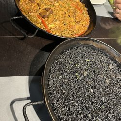 Meat paella and squid ink paella