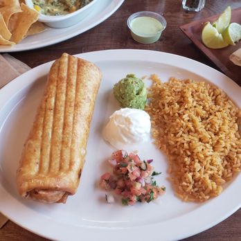 Salsa Verde - Salsa Verde Pork Chimi. Love the presentation! - Mexican Near Me - Tucson, Arizona
