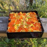 Photo of Urasawa - Beverly Hills, CA, United States. Sushi rice covered with ikura, uni, unagi, and some kind of vegetable