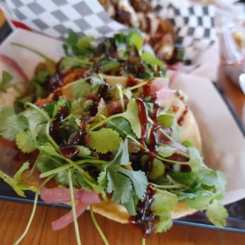 Christina’s Cartel - a plate of food on a table - Chicken Wings Near Me - Happy Valley, Oregon