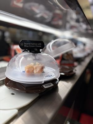 Kura Revolving Sushi Bar by null