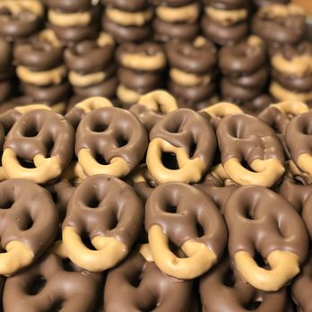 Mueller Chocolate - a pile of chocolate covered pretzels - Chocolatiers & Shops Near Me - Philadelphia, Pennsylvania Mueller Chocolate - a pile of chocolate covered pretzels - Chocolatiers & Shops Near Me - Philadelphia, Pennsylvania