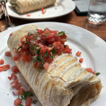 The Grove Yerba Buena - His and hers Breakfast Burrito, shared mimosa. All wonderful - New American Near Me - San Francisco, California The Grove Yerba Buena - His and hers Breakfast Burrito, shared mimosa. All wonderful - New American Near Me - San Francisco, California