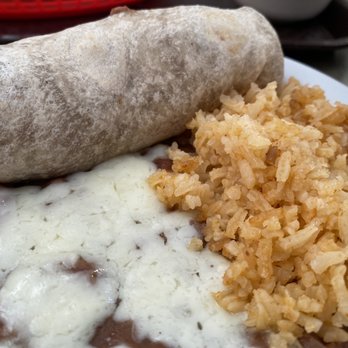 Taqueria Yvette - Kids plate: Beef and cheese burrito with rice and beans - Mexican Near Me - Manteca, California Taqueria Yvette - Kids plate: Beef and cheese burrito with rice and beans - Mexican Near Me - Manteca, California