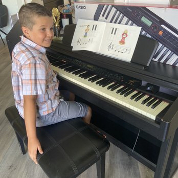 Music-N-Smart - Jacob waiting for his piano class - Musical Instruments & Teachers Near Me - Chino, California Music-N-Smart - Jacob waiting for his piano class - Musical Instruments & Teachers Near Me - Chino, California