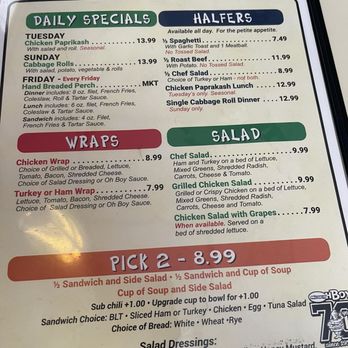 Midway Oh-Boy Restaurant - Menu - Menu from Midway Oh Boy Restaurant displaying daily specials, wraps, salads, and half-portion meals with prices and descriptions. - American Near Me - Elyria, Ohio