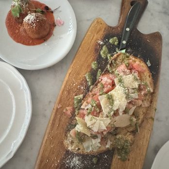 Roman Wolves - Bruschetta (happy hour) it's shareable! And HH meatballs - Italian Near Me - San Diego, California Roman Wolves - Bruschetta (happy hour) it's shareable! And HH meatballs - Italian Near Me - San Diego, California