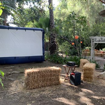 JC Party Rentals - Outdoor inflatable movie screen, projector, and Bluetooth speaker. - Party Equipment Rentals Near Me