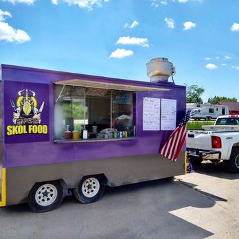 SKOL Food - a purple food truck parked in a parking lot - Food Trucks Near Me SKOL Food - a purple food truck parked in a parking lot - Food Trucks Near Me