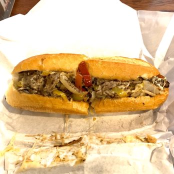 Tat's Delicatessen - Cheesesteak- Swiss, Grilled Onions, Sweet Peppers, Hot Peppers - Delis Near Me - Seattle, Washington Tat's Delicatessen - Cheesesteak- Swiss, Grilled Onions, Sweet Peppers, Hot Peppers - Delis Near Me - Seattle, Washington