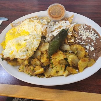 Rodeo Cafe - Chilaquiles, potatoes, beans, over hard eggs. - Cafes Near Me - Rancho Cucamonga, California Rodeo Cafe - Chilaquiles, potatoes, beans, over hard eggs. - Cafes Near Me - Rancho Cucamonga, California
