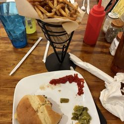 Trading Post Market - Forgot to take pic right away. Green chille Burger, chilies falling out.