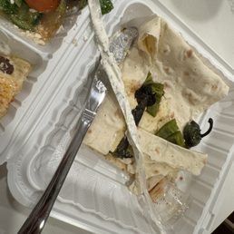 Plastic wrap in cucumber yogurt.