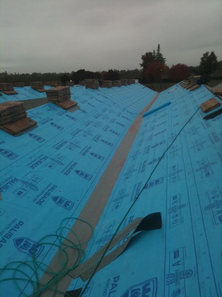 Slide of At the Top Roofing