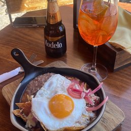 Chilaquiles and aperol spritz.