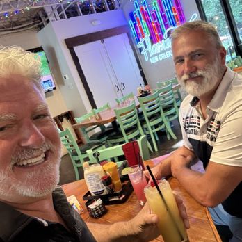 Flamingo A Go Go - Happy clients with drinks. - New American Near Me - New Orleans, Louisiana