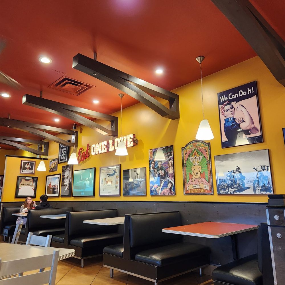 Raising Cane's Chicken Fingers - the interior of a restaurant - Chicken Wings Near Me - Columbus, Ohio Raising Cane's Chicken Fingers - the interior of a restaurant - Chicken Wings Near Me - Columbus, Ohio