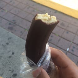 Frozen banana dipped in chocolate