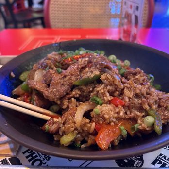 Famous Foods Street Eats - crispy rice with steak in clay pot. - Food Court Near Me - Las Vegas, Nevada