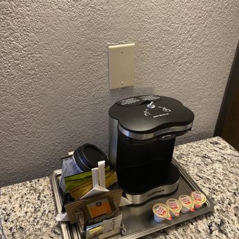 Hilton Arlington - Coffee bar that has no outlet for the coffee machine. Just for looks. - Hotels Near Me - Arlington, Texas