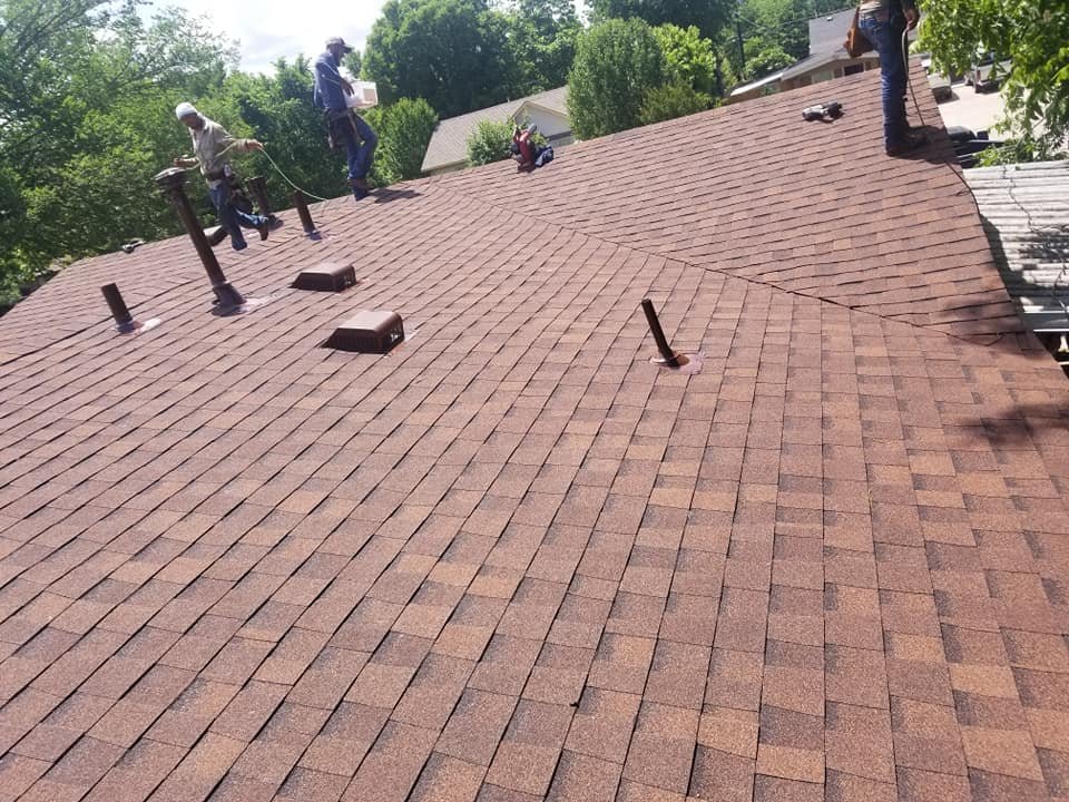 Slide of Precision Roofing