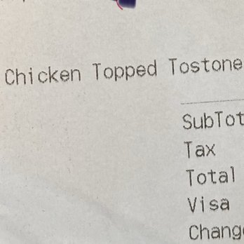 Pollo Tropical - What do you see there? CHICKEN topped Tostones. Right? You pay $7.... - Fast Food Near Me - Miami, Florida