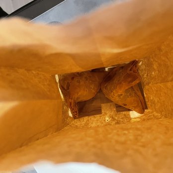 Turmeric The Indian Eatery - the inside of a paper bag - Indian Near Me - London, Ontario Turmeric The Indian Eatery - the inside of a paper bag - Indian Near Me - London, Ontario
