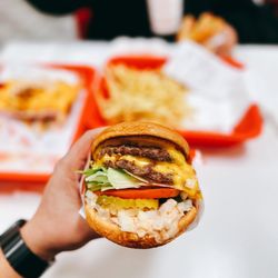 In-N-Out Burger - Double Double, animal style, bun extra toasted, add chopped raw onion.