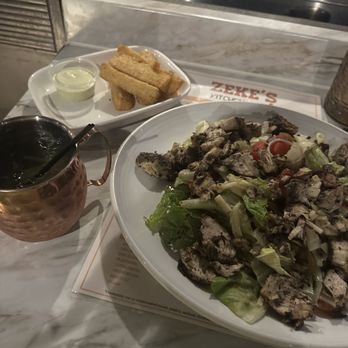 Zeke's Kitchen & Bar - Jerk chicken salad and yucca frites - New American Near Me - Smyrna, Georgia Zeke's Kitchen & Bar - Jerk chicken salad and yucca frites - New American Near Me - Smyrna, Georgia