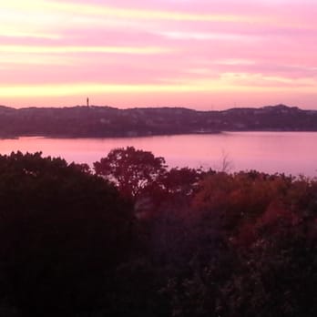 Lake Travis - Zinfandel-colored summer sunset on Lake Travis, looking west towards Hudson's Bend in the distance. - Lakes Near Me