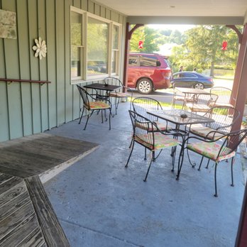 The Tom X Pub - a patio with tables and chairs - American Near Me - East Stroudsburg, Pennsylvania