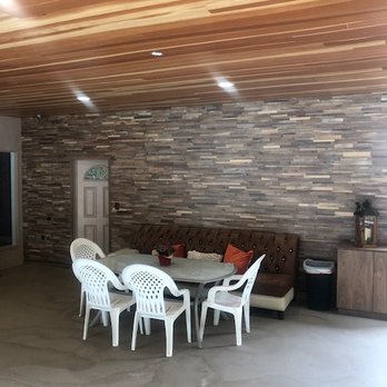 Hb Flooring - a living room with a couch and a dining table - Flooring Near Me - Van Nuys, California
