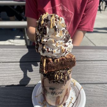 The Yard Milkshake Bar - The Peanut Butter Brownie milkshake- to eat it we deconstructed it. We took the brownie with the whipped cream and put it on the plate. - Ice Cream & Frozen Yogurt Near Me - Vancouver, Washington