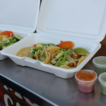 Tacos El Rodeo - two take out containers of food - Food Trucks Near Me - Philadelphia, Pennsylvania Tacos El Rodeo - two take out containers of food - Food Trucks Near Me - Philadelphia, Pennsylvania