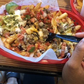 The Taco Stand - Carne Asada Fries in the photo. We also ordered Al Pastor Taco, Baja Taco,Chips and Guacamole are all awesome. - Mexican Near Me - Miami, Florida The Taco Stand - Carne Asada Fries in the photo. We also ordered Al Pastor Taco, Baja Taco,Chips and Guacamole are all awesome. - Mexican Near Me - Miami, Florida