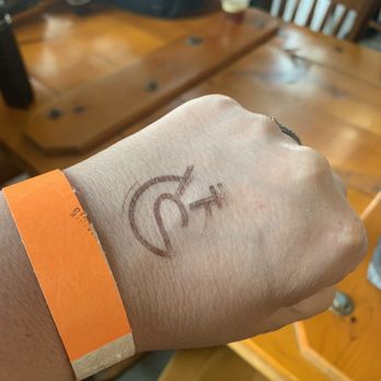 Rabid Brewing - a person's wrist with a wristband with the word rabid on it - Breweries Near Me - Homewood, Illinois Rabid Brewing - a person's wrist with a wristband with the word rabid on it - Breweries Near Me - Homewood, Illinois