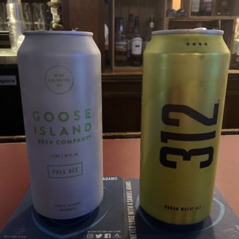 Duffy's Tavern - two cans of beer on coasters - Dive Bars Near Me - Forest Park, Illinois