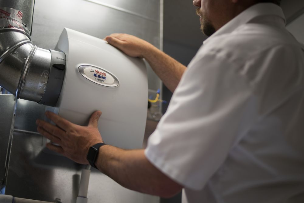 Slide of Manwill Plumbing Heating & Air Conditioning