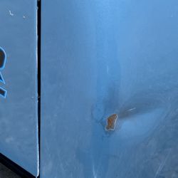 Blacktop Customs - Dent on right rear quarter panel near tailgate.