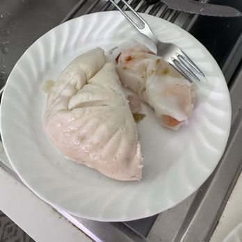 Mei Lai Wah Bakery - Half of a big bun with chicken, pork and egg and a portion of shrimp rice noodle roll - Bakeries Near Me - New York, New York